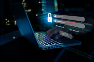 Security professional entering credentials on a secure login screen.