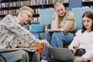 College students in library collaborating.