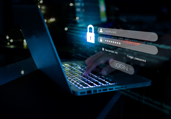 Security professional entering credentials on a secure login screen.