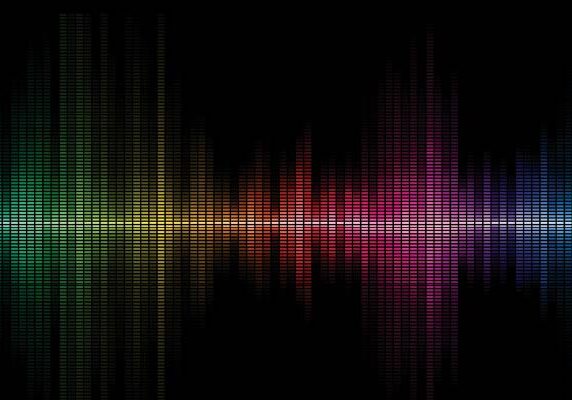 Colorful data lines streaming across a dark background, symbolizing digital connectivity.